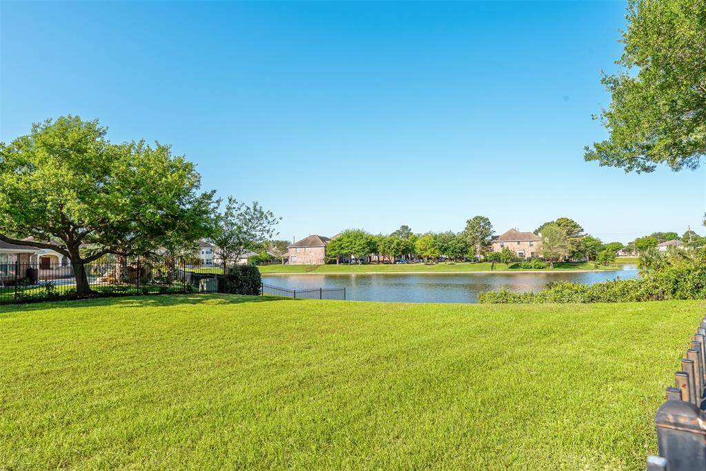 View from the back of the home overlooking the subdivision lake.