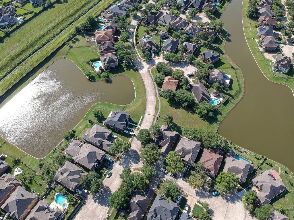 Aerial view of home with close proximity to the lakes.