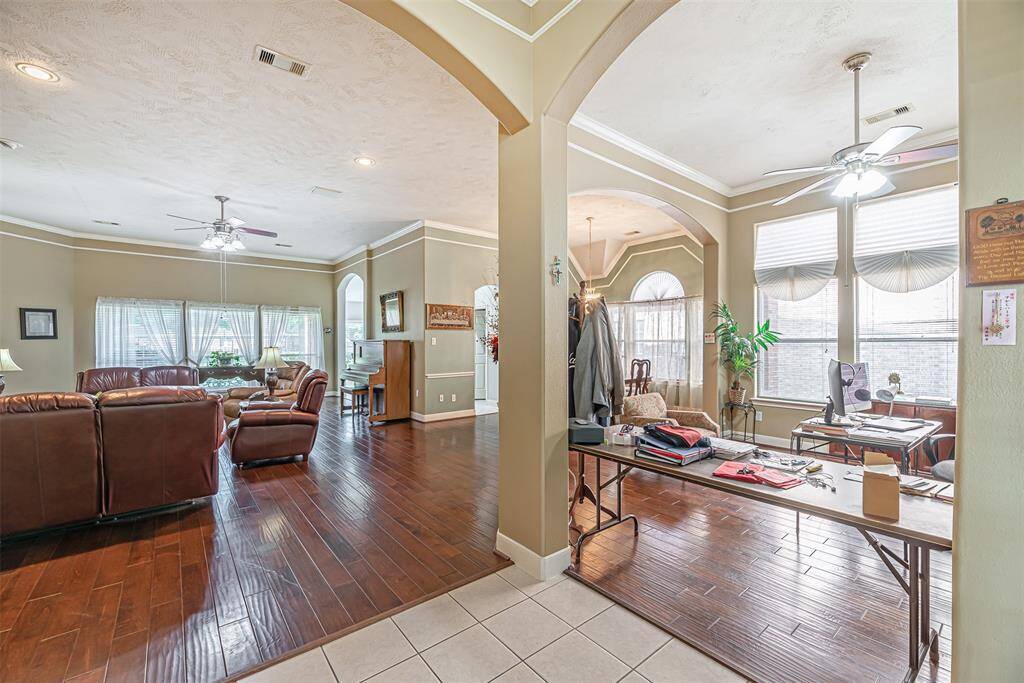 Open concept living with decorative finishes throughout the main living areas.