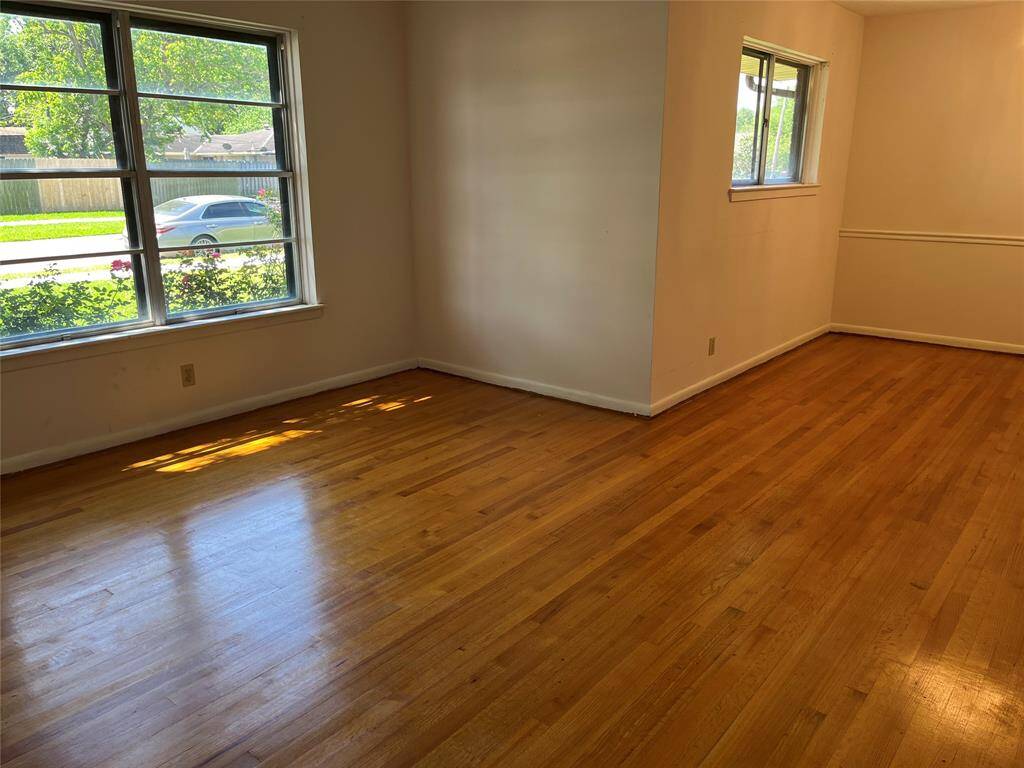 We've just come through the front door and are standing in the entry, looking into the formal living and dining rooms. The living room is first.