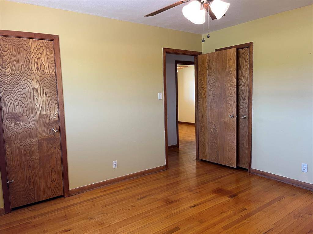 The walk-in closet is through the door to the left and we are now looking back toward the hall. The bath would be to the far right, just outside this picture.