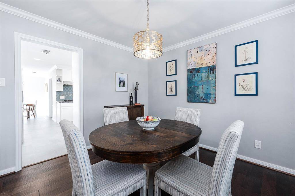 Formal dining with pass through to the kitchen for convenience.