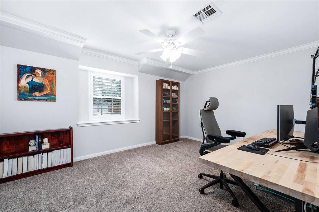Secondary bedroom currently used as an office off the front left of the home.