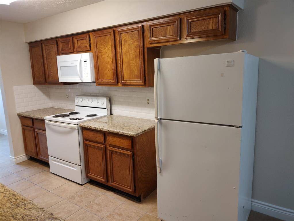 I have granite and a refrigerator!