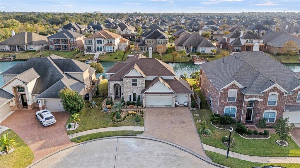 Waterfront, cul-de-sac lot as showcased in this aerial photo.