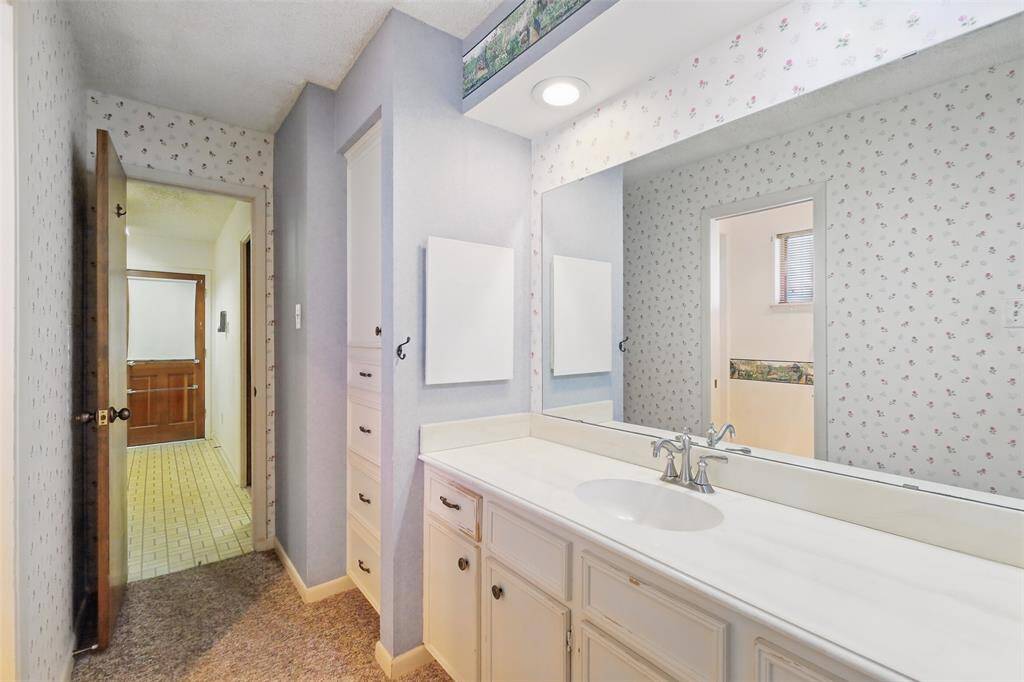 The Primary Bath also offers a Shower and grab bars for safety.