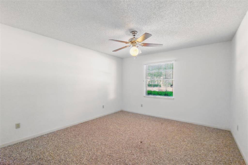 This Secondary Bedroom is 14' x 13' with another Walk-in Closet!