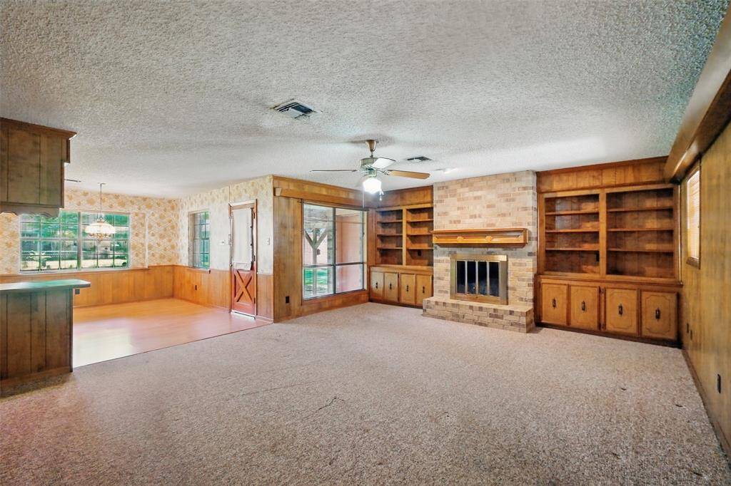 A panoramic view of the Family Room as seen from the Entry Foyer.