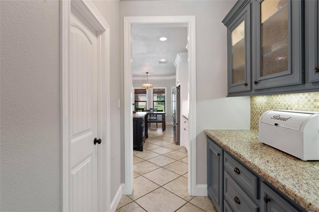 Butlers pantry across from the large walk in pantry.