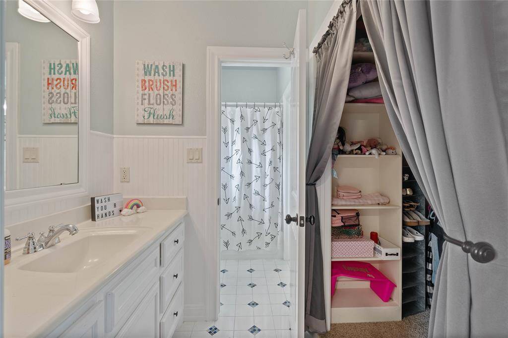 Jack and Jill with extra large walk in closet.