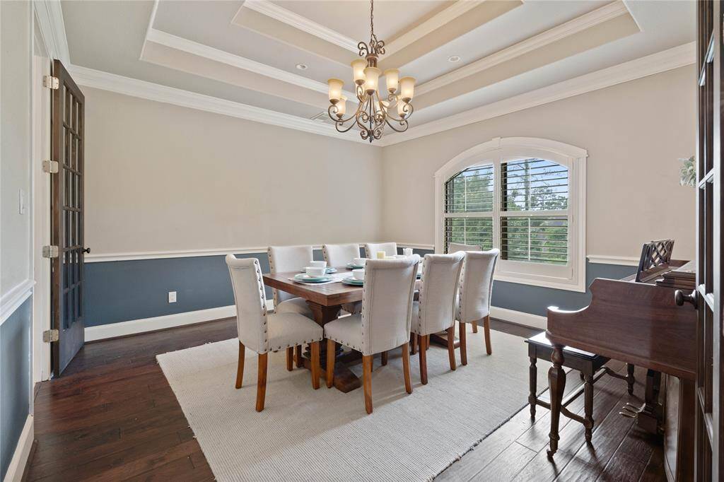 Formal dining overlooks the front yard.