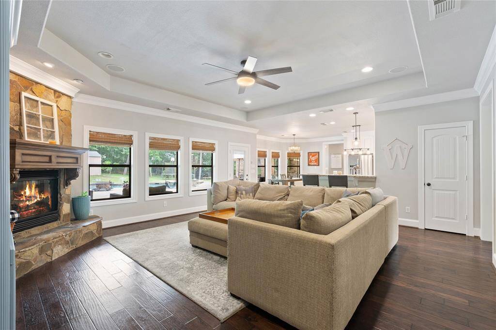 Hallway leading in to family room. Look at that tray ceiling!