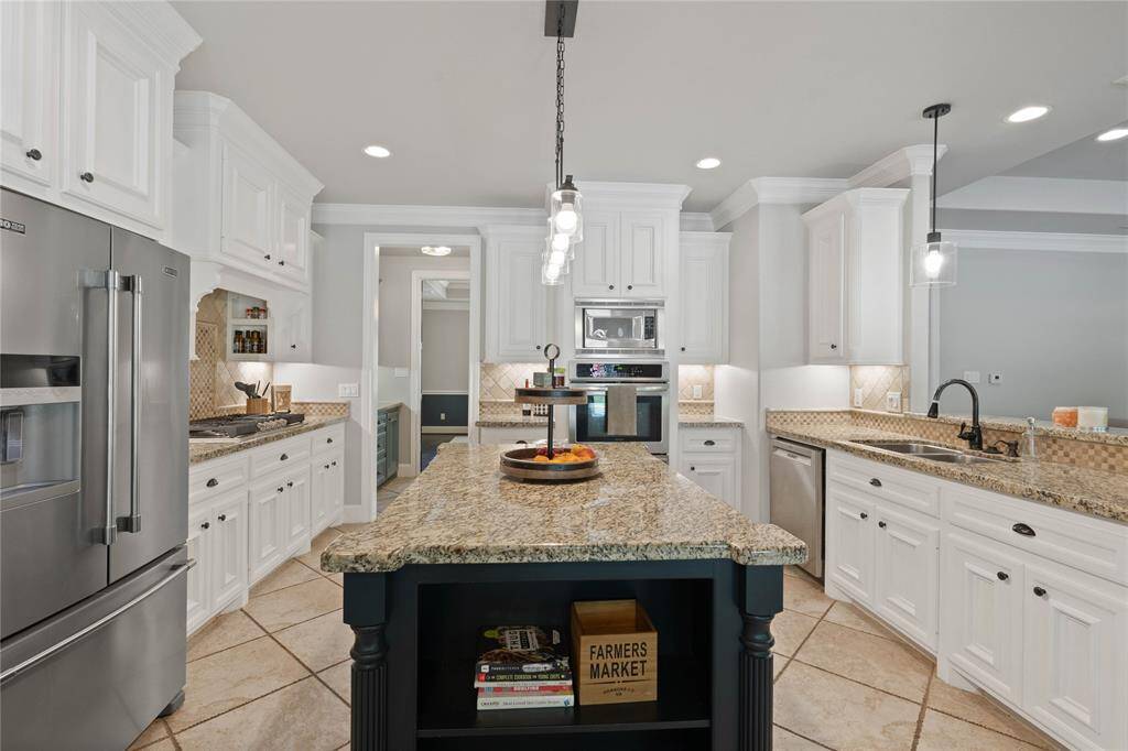 Island with wine fridge, new double oven and new gas range!