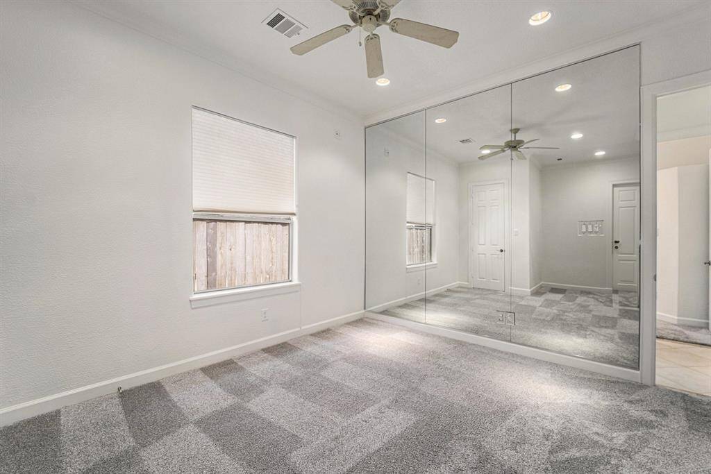 One of the secondary bedrooms is right off the garage
