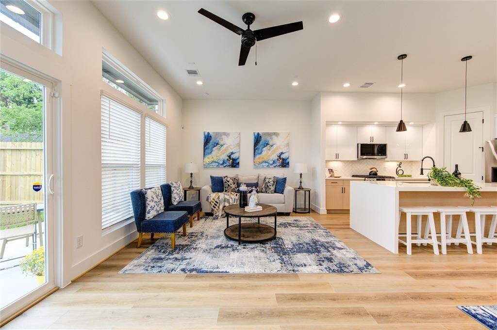 Large living area that opens to your private fenced in backyard.