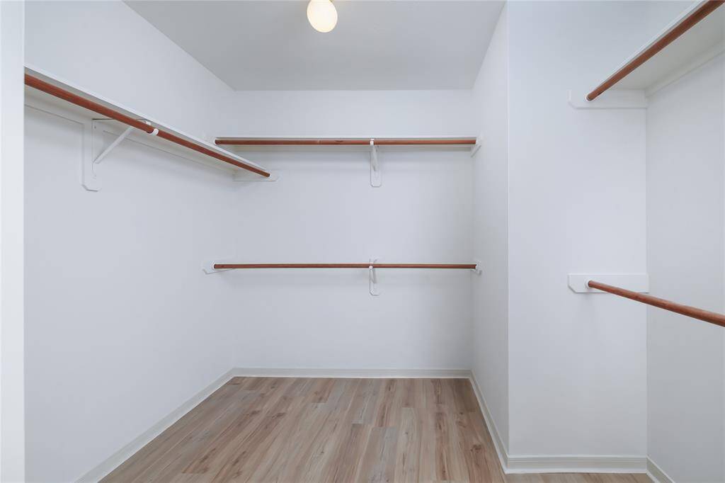 Large walk-in closet in the primary bedroom suite.