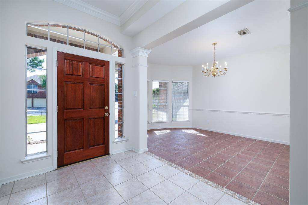 The foyer and formal dining room.