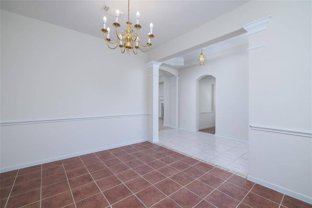 The view from the formal dining area looking towards the foyer.