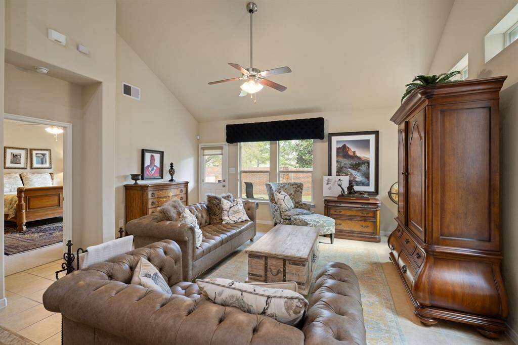 The convenient door access to the back patio area allows for easy outdoor enjoyment. The easy care expanded tile floors will be appreciated.