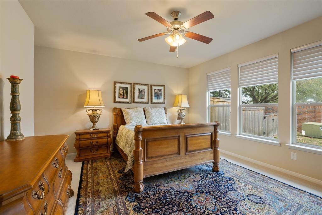 Step into your personal sanctuary! This main floor primary bedroom, offers a luxurious escape. The generous size ensures a spacious and inviting retreat.