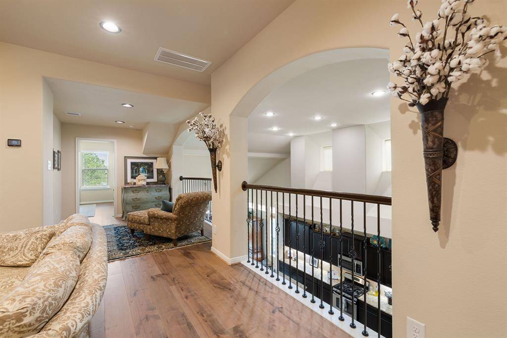 Take note of the upgraded flooring and the soft, neutral paint palette that creates a warm and inviting atmosphere throughout the home.