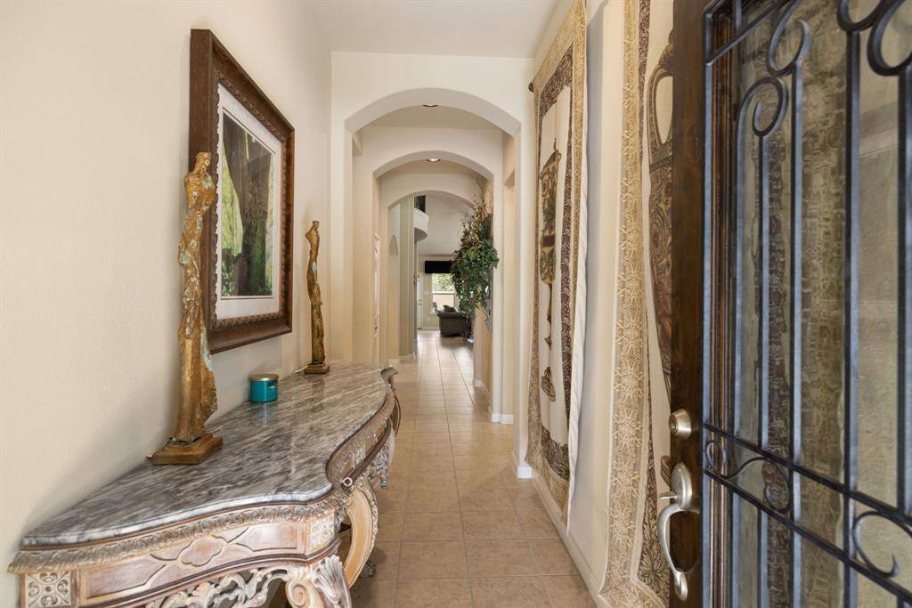 This home features three bedrooms and three full bathrooms with a sought after 2 bedrooms down layout. The dedicated study provides a perfect space for work or quiet reflection. Entertain guests in the elegant formal dining area, and enjoy the comfort of two expansive living rooms. Upstairs, discover a versatile game room or additional living space, offering endless possibilities for relaxation and enjoyment.
