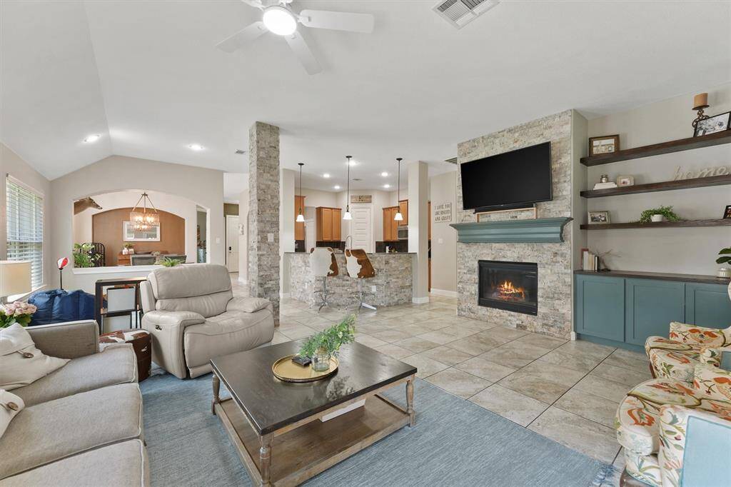 The spacious family room offers a comfortable place to gather