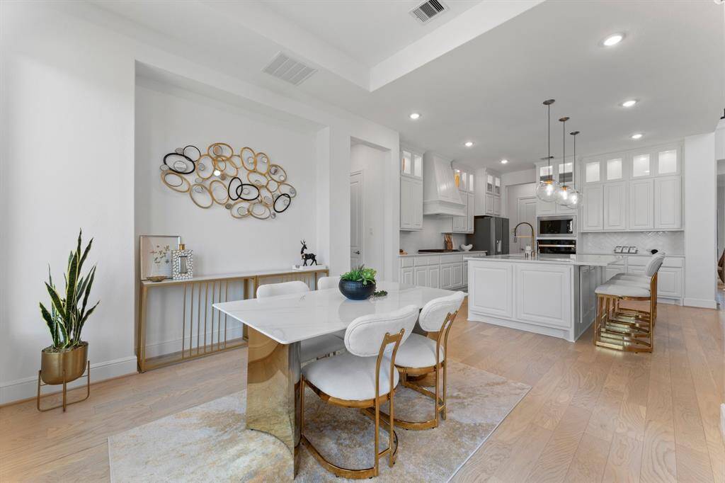 The conveniently located breakfast nook opens up nicely to the spacious kitchen!