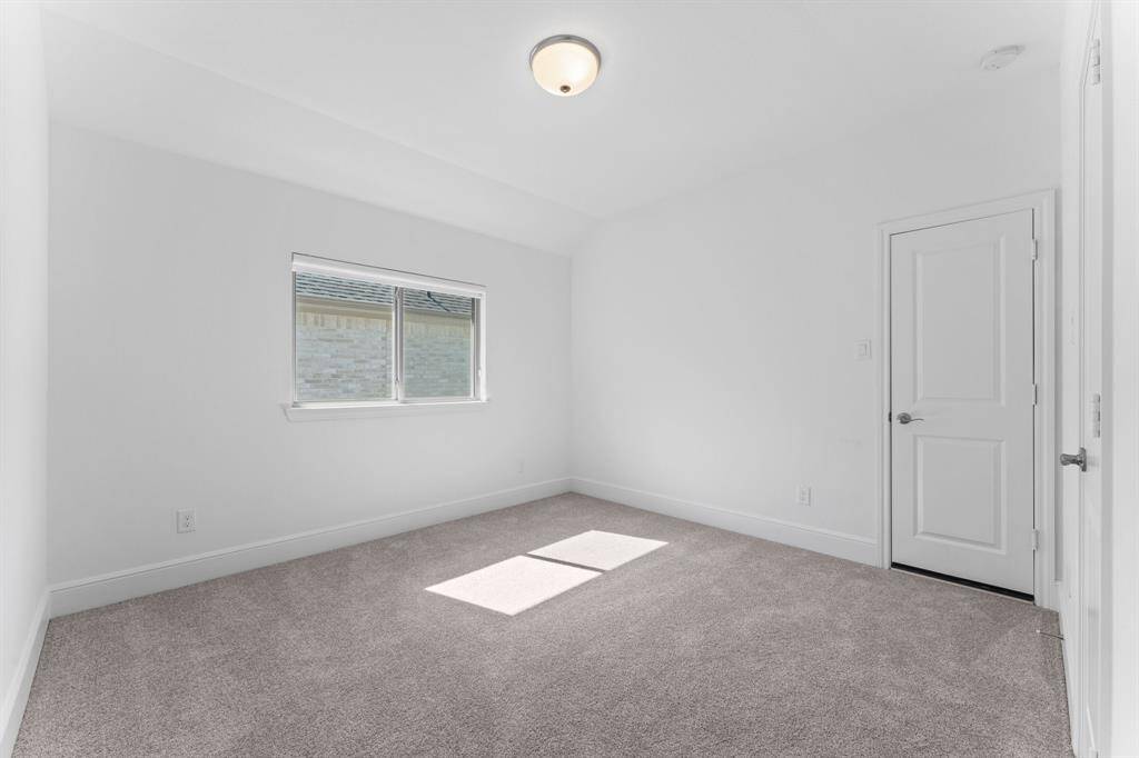 A clean slate full of potential—this bright bedroom is ready to be personalized to fit your style and needs.