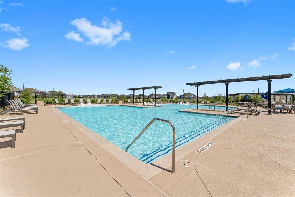 Dive into relaxation—this sparkling community resort style pool is truly impressive!