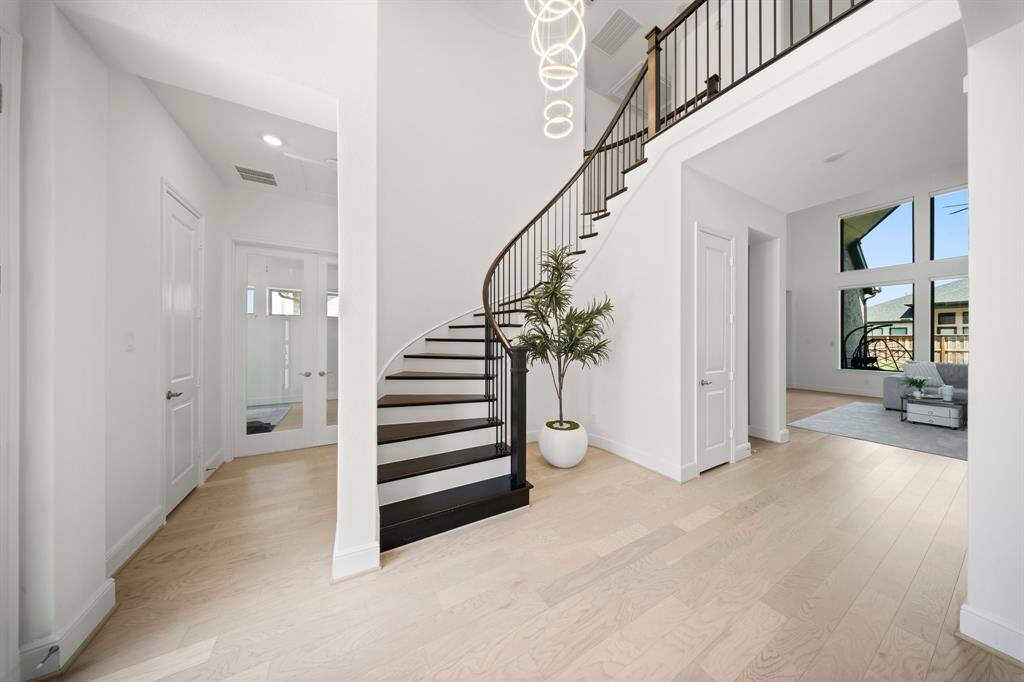The beautiful wooden curved staircase is simply amazing!