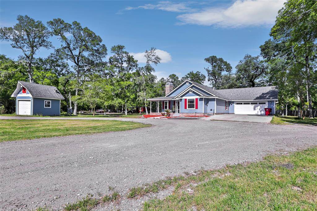 Well house with room to store lawn mower and other items.