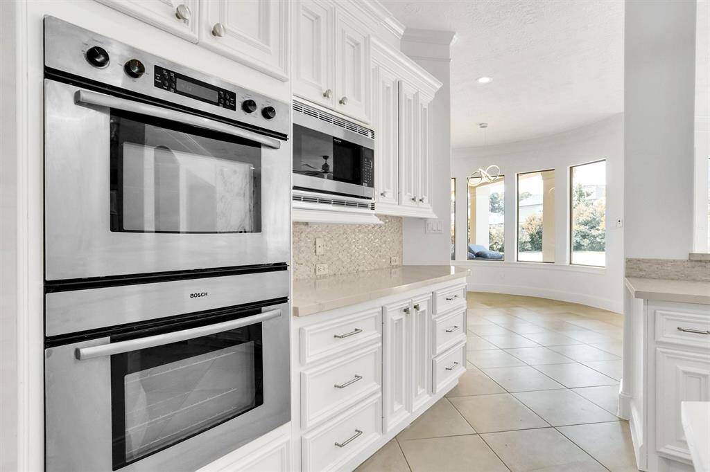 This kitchen will not disappoint! There is plenty of storage and counterspace making it every chef's dream! It opens to the family room and breakfast nook making it perfect to host any event or holiday!