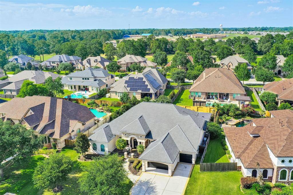 An aerial view of this beautiful home in a picturesque suburban community.