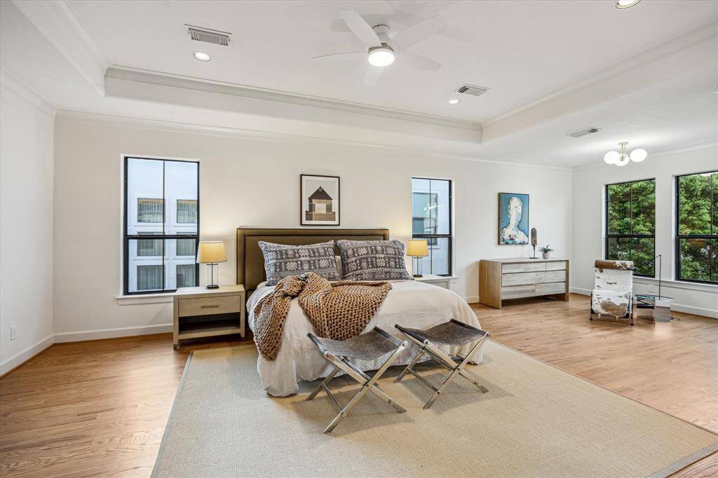 Grand Primary Bedroom complete with double closets, a reading nook /office space and private balcony for your morning coffee