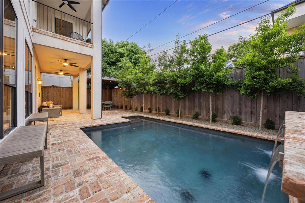 Fantastic backyard oasis complete with sparkling Pool with brick surround, a water feature, dining area with pergola as well as a sitting area, all professionally landscaped!
