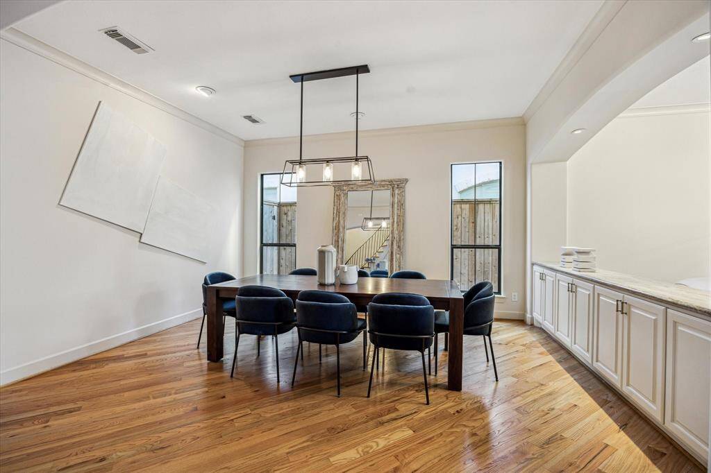 Spacious formal dining with built in buffet open to the formal living