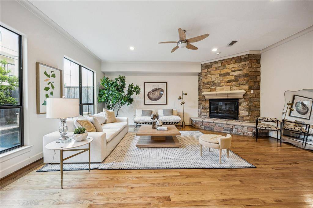 Family Room complete with grand stone  fireplace
