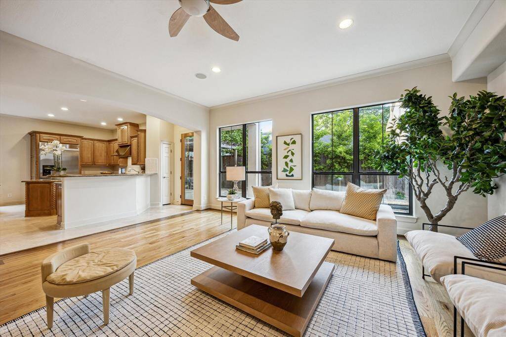 Family room view showing the open concept view of kitchen and exterior access.