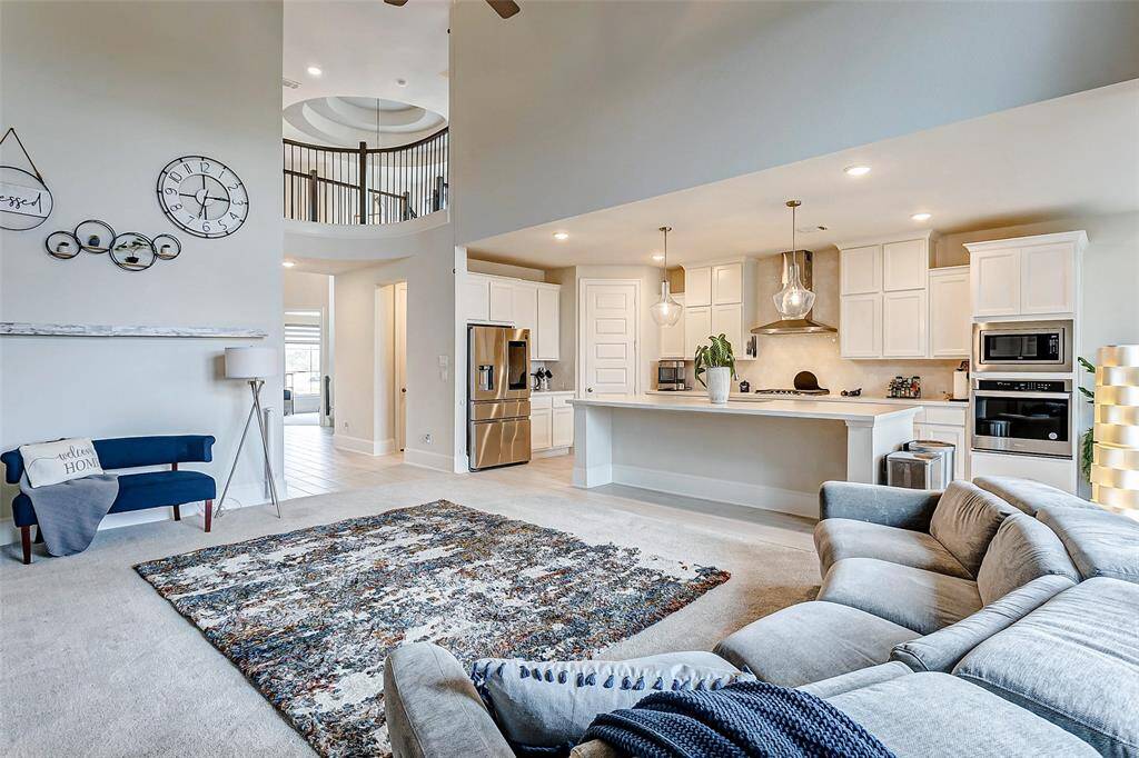 Airy living room with soaring ceiling