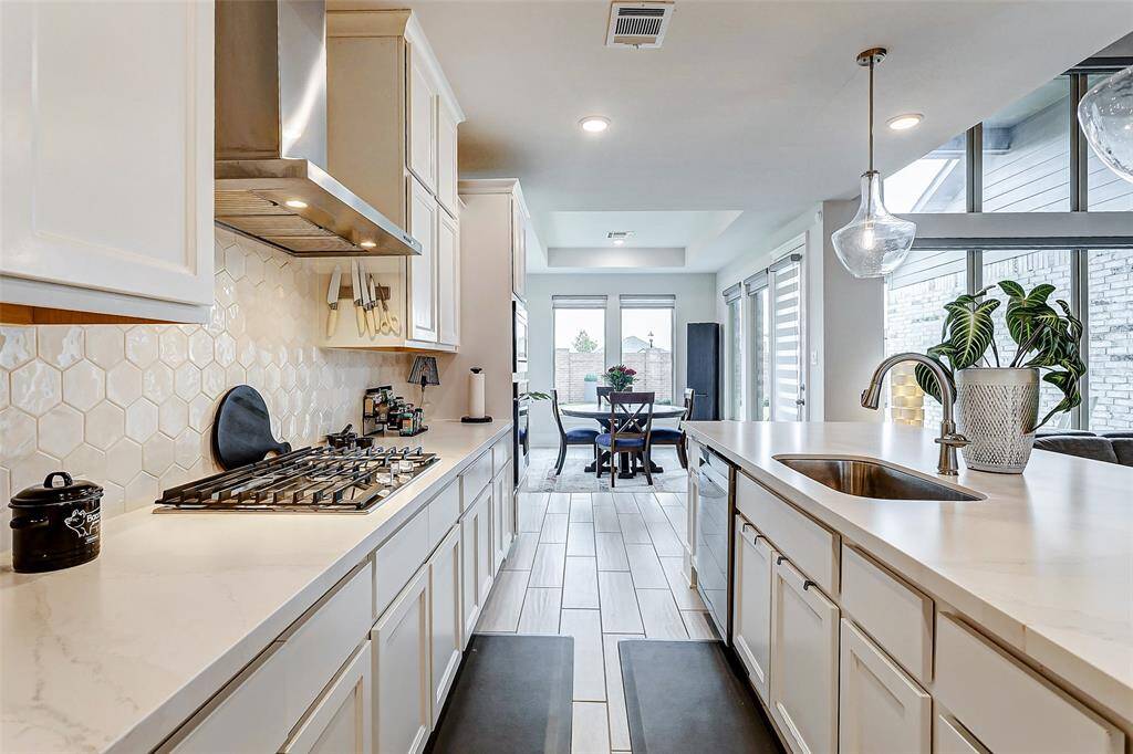Gourmet kitchen with expansive island.