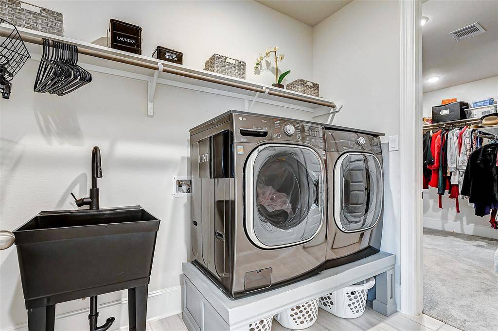 Spacious and convenient laundry adjacent to the primary closet