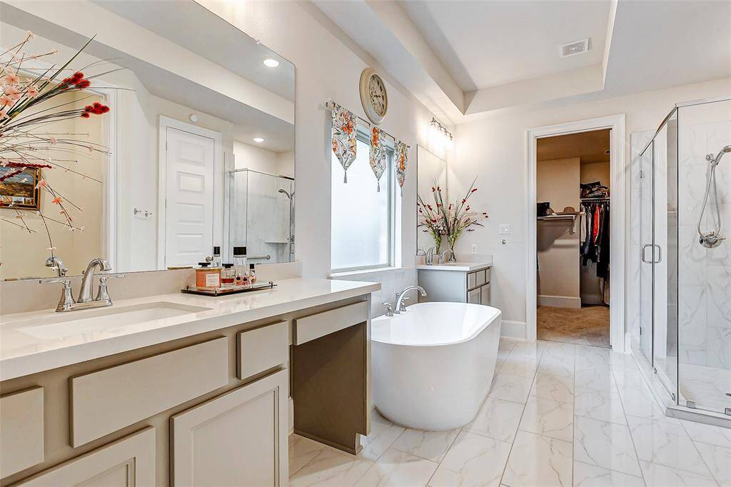 Spacious bathroom with dual vanity