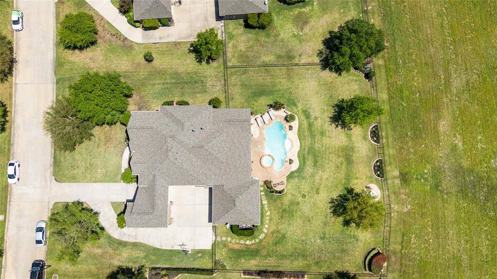This perspective offers an aerial view of the house from above.