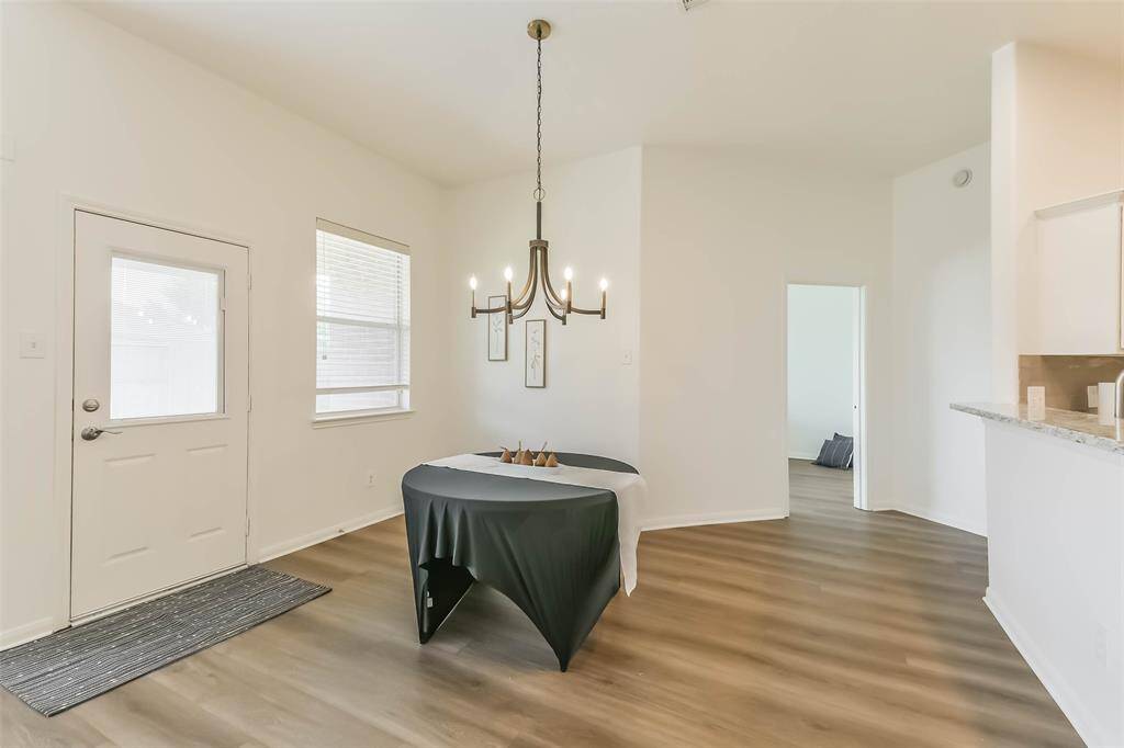 Spacious dining area ready for a larger table to host memorable gatherings.