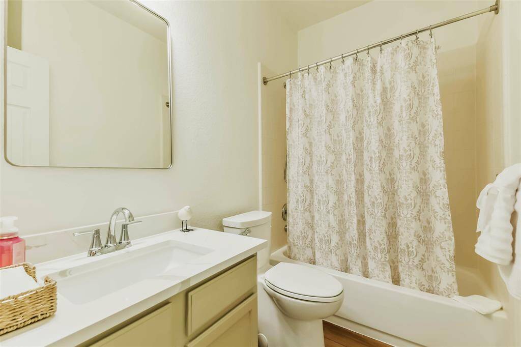 Hall Guest bathroom with new Quartz countertops.