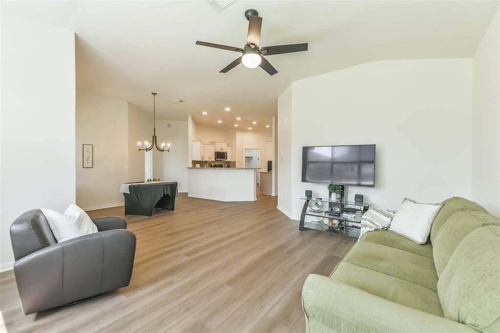 An open floor plan allows you to keep a clear eye on the kids or visit with your guest.