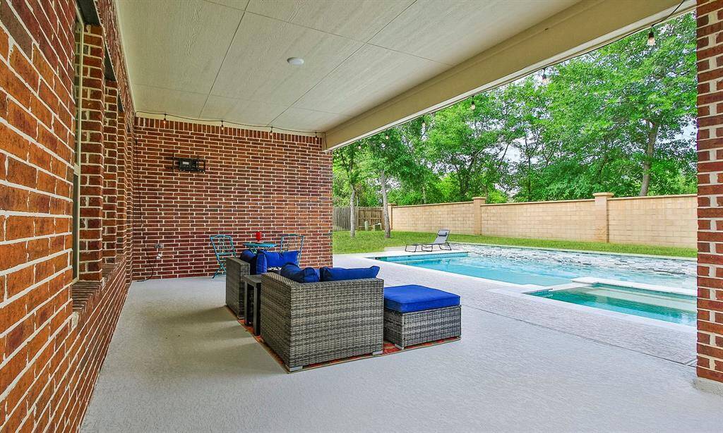 Your outdoor oasis is waiting!  Relax under the covered patio or soak in the sparkling pool or hot tub.