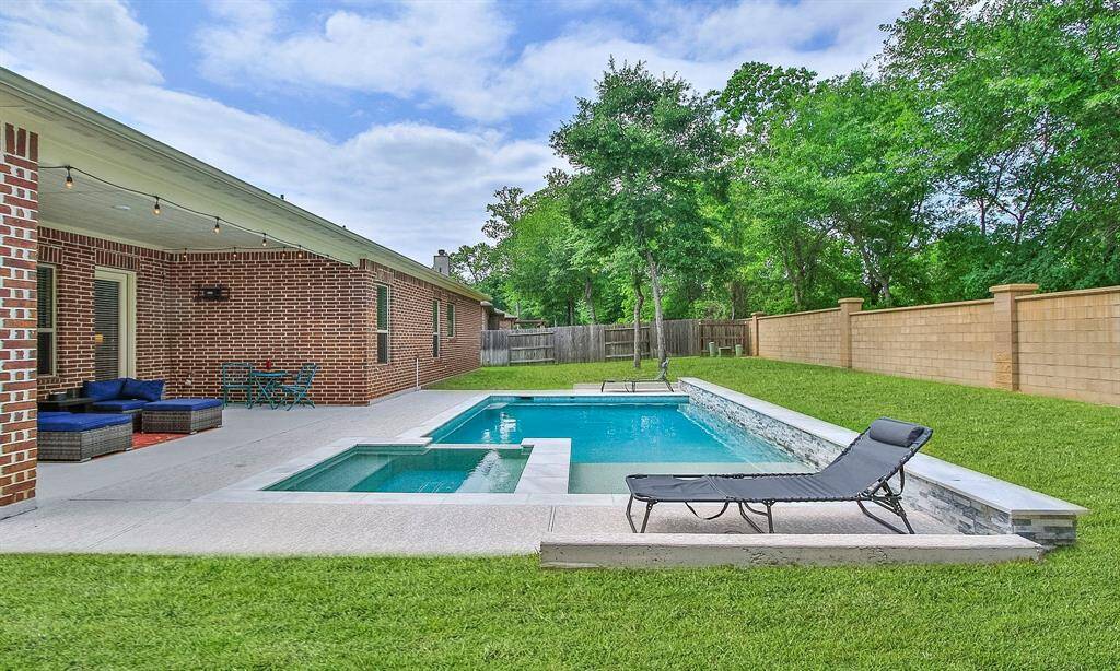 Quality built Gunite pool with Pebbletec surface, marble coping and textured concrete decking.  The pool has a UV cleaner, auto-fill and lights controlled from a phone app.