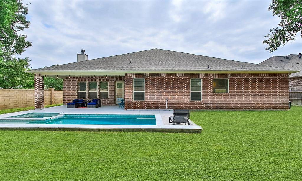 Notice how the pool was designed to balance the fun and splashing with plenty of green space.